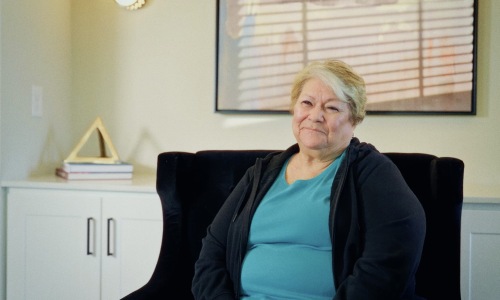 a woman sitting down